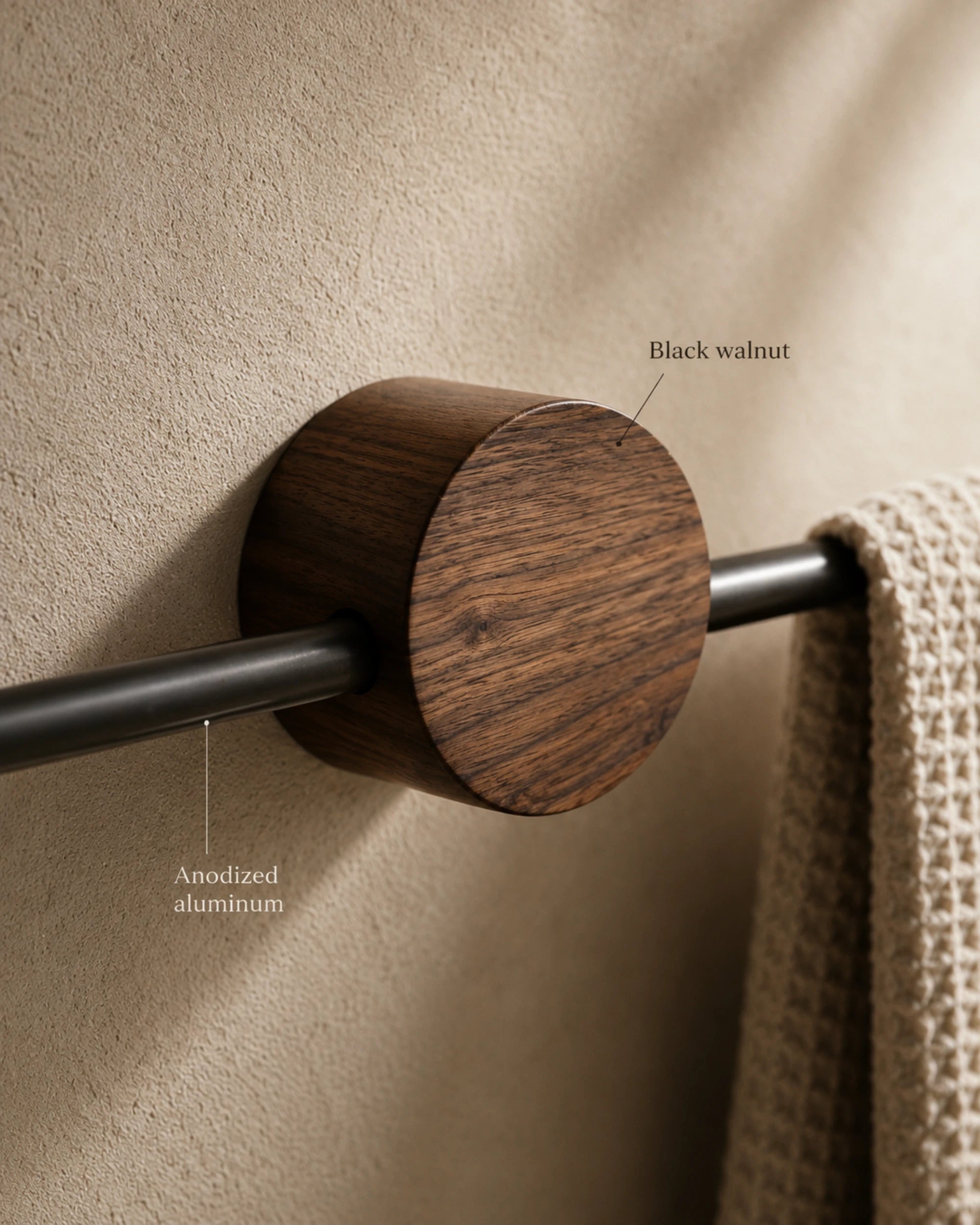 Adjustable walnut towel bar with black wall mount