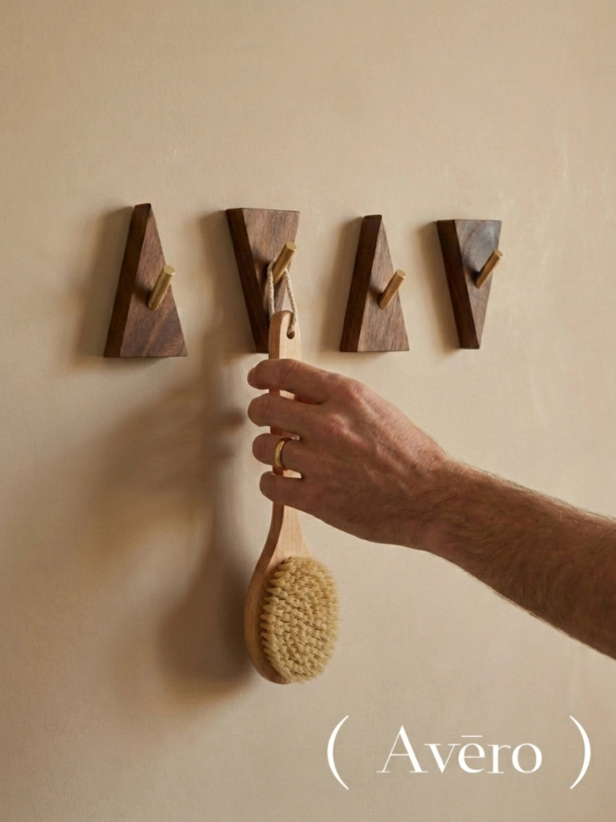Geometric walnut and brass wall hooks four piece set
