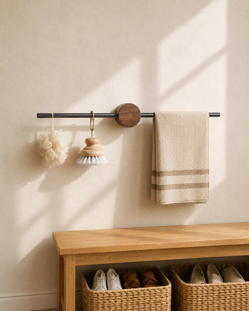 Adjustable walnut towel bar with black wall mount